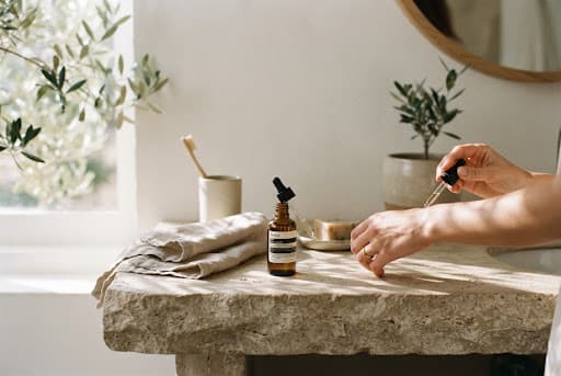 Sunlit minimalist stone vanity personal care ritual